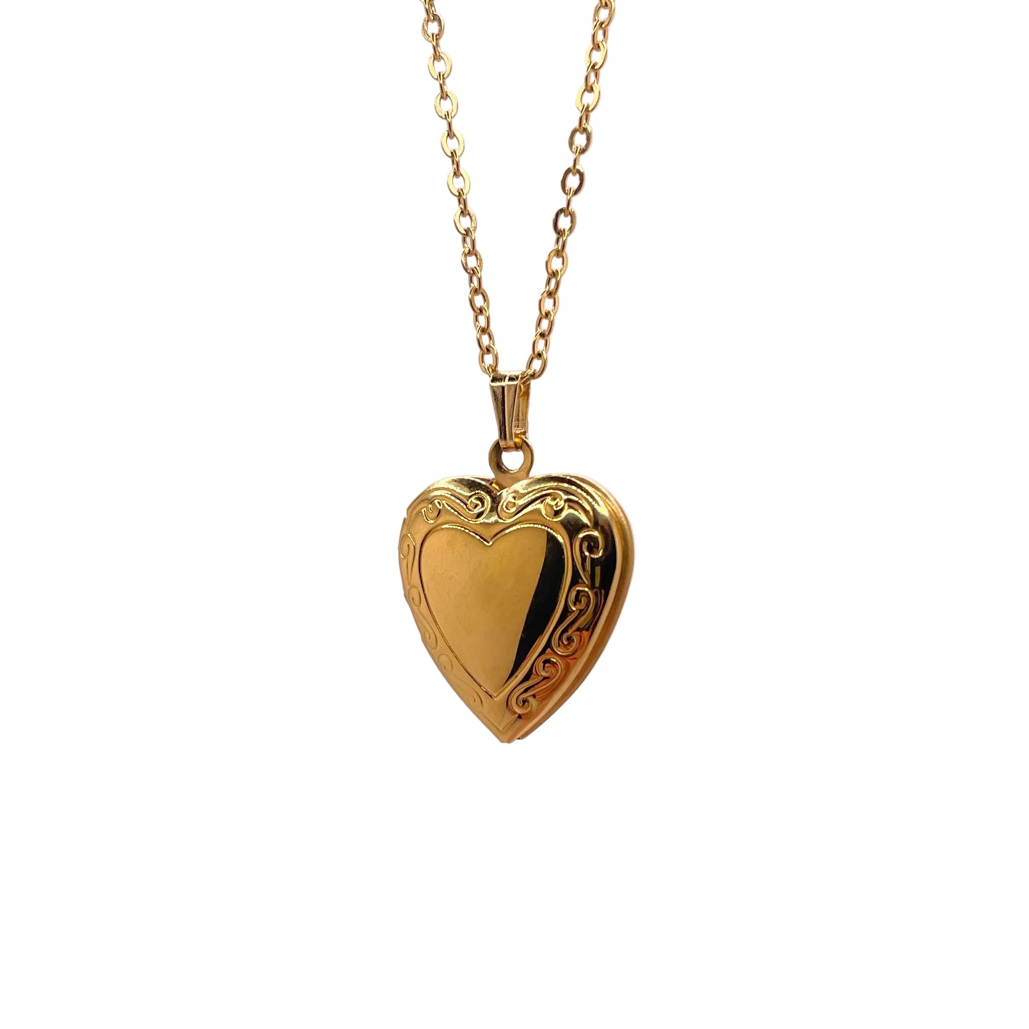 A gold heart-shaped locket necklace on a chain, displayed against a white background.